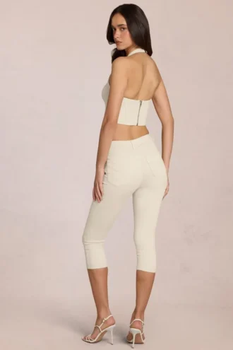 Vaqueros capri de talle medio Anessa en color marfil