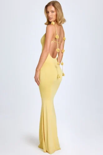 Vestido Aldona de jersey elástico con apliques florales en amarillo pastel