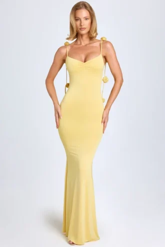 Vestido Aldona de jersey elástico con apliques florales en amarillo pastel