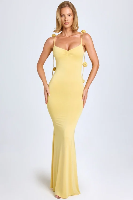Vestido Aldona de jersey elástico con apliques florales en amarillo pastel Vestido Aldona de jersey elástico con apliques florales en amarillo pastel