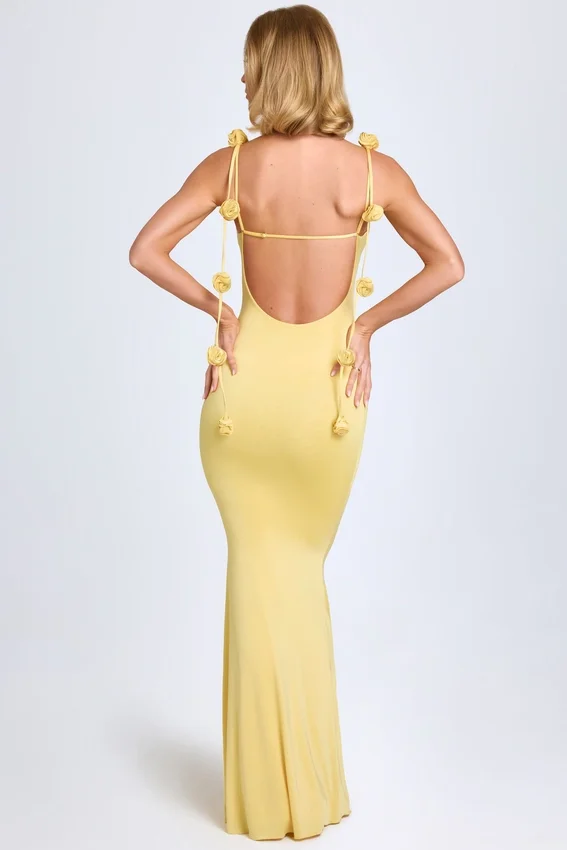 Vestido Aldona de jersey elástico con apliques florales en amarillo pastel Vestido Aldona de jersey elástico con apliques florales en amarillo pastel