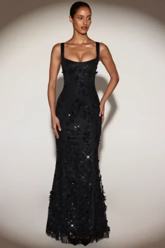 Vestido corsé con escote redondeado y apliques decorativos Vasanta en negro