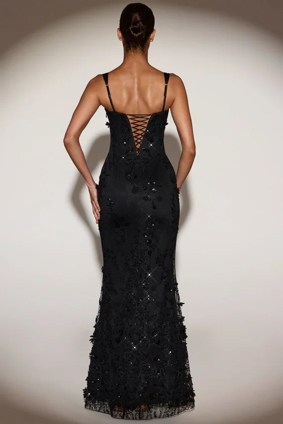 Vestido corsé con escote redondeado y apliques decorativos Vasanta en negro Vestido corsé con escote redondeado y apliques decorativos Vasanta en negro