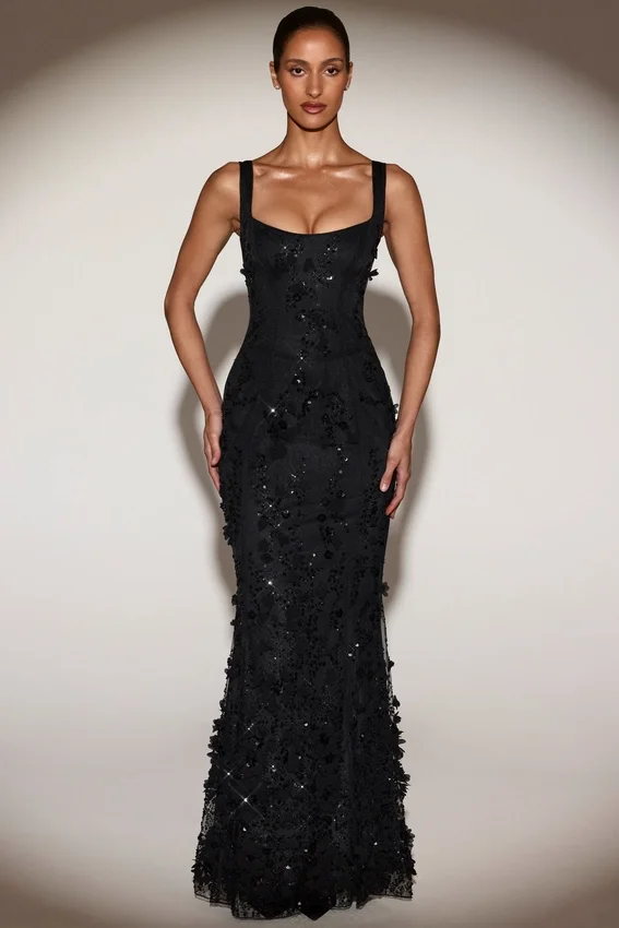 Vestido corsé con escote redondeado y apliques decorativos Vasanta en negro Vestido corsé con escote redondeado y apliques decorativos Vasanta en negro