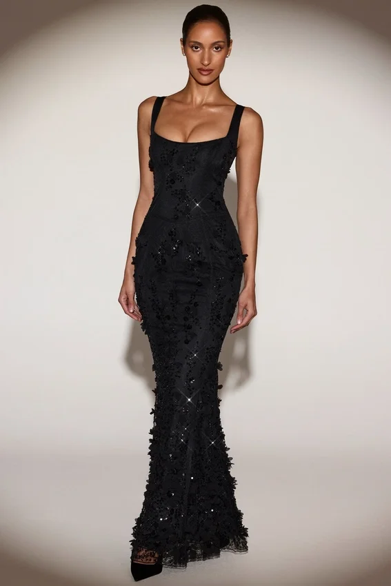 Vestido corsé con escote redondeado y apliques decorativos Vasanta en negro Vestido corsé con escote redondeado y apliques decorativos Vasanta en negro