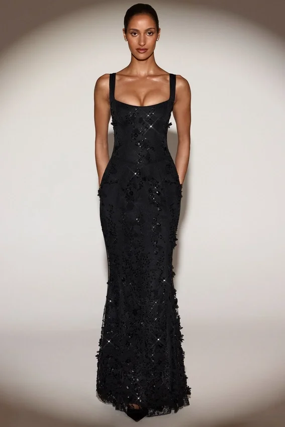 Vestido corsé con escote redondeado y apliques decorativos Vasanta en negro Vestido corsé con escote redondeado y apliques decorativos Vasanta en negro