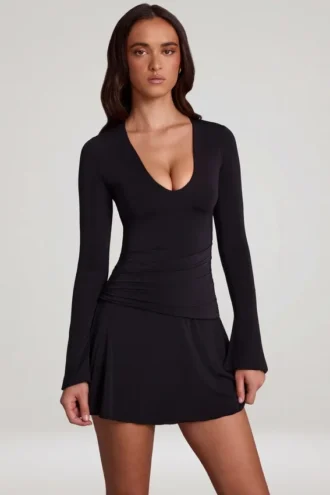 Vestido corto acampanado de jersey suave con cuello redondo Carielle en negro