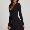 Vestido corto acampanado de jersey suave con cuello redondo Carielle en negro Vestido corto acampanado de jersey suave con cuello redondo Carielle en negro