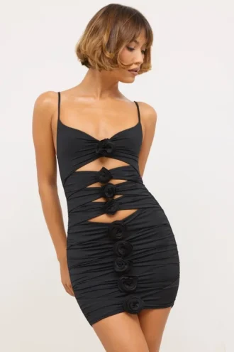 Vestido corto Aniela de jersey elástico con detalles de rosas y aberturas en negro