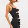 Vestido corto Aniela de jersey elástico con detalles de rosas y aberturas en negro Vestido corto Aniela de jersey elástico con detalles de rosas y aberturas en negro