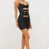 Vestido corto Aniela de jersey elástico con detalles de rosas y aberturas en negro Vestido corto Aniela de jersey elástico con detalles de rosas y aberturas en negro