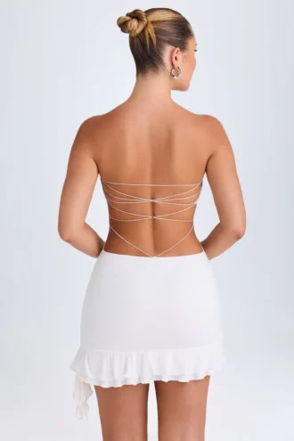 Vestido corto bandeau con volantes y aberturas Misa en blanco