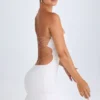 Vestido corto bandeau con volantes y aberturas Misa en blanco