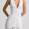 Vestido corto Calina de popelín de algodón con calados, corte en A, en color blanco Vestido corto Calina de popelín de algodón con calados, corte en A, en color blanco