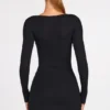 Vestido corto Caris de manga larga con encaje y modal acanalado en negro