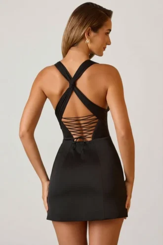 Vestido corto Carlotta con cuello halter, cordones y corte en A en negro