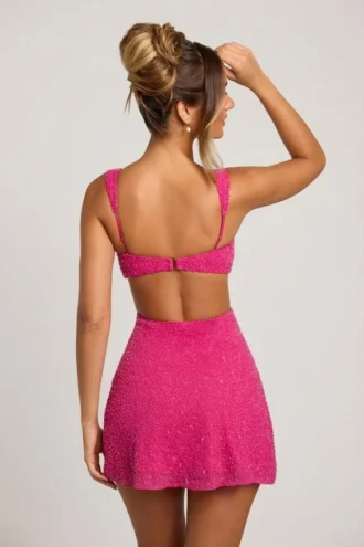 Vestido corto con aberturas y adornos Emilion en fucsia