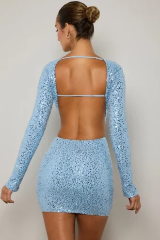 Vestido corto con aberturas y adornos Marva en azul claro