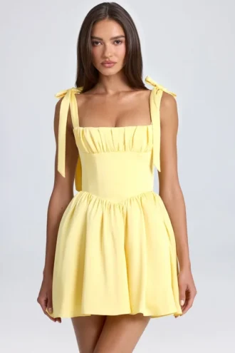 Vestido corto con corsé drapeado Bellamy en color sorbete de limón