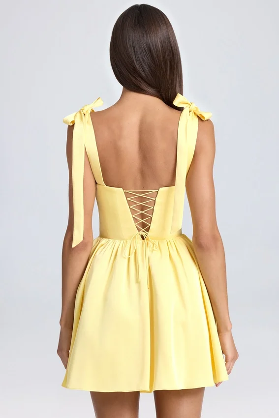 Vestido corto con corsé drapeado Bellamy en color sorbete de limón