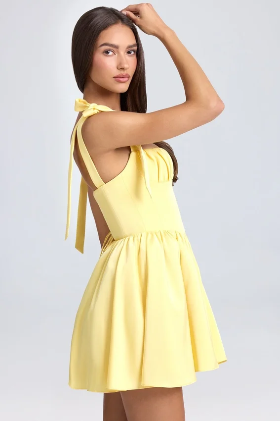 Vestido corto con corsé drapeado Bellamy en color sorbete de limón