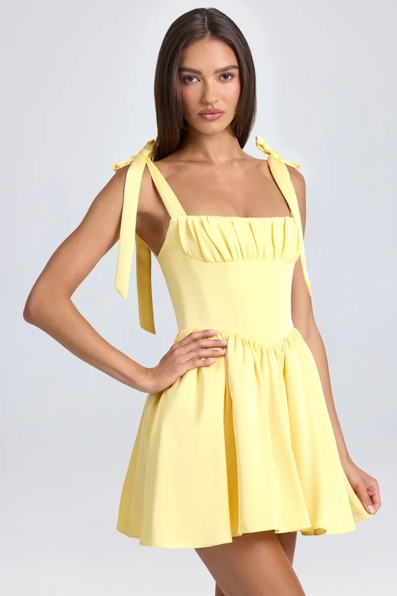 Vestido corto con corsé drapeado Bellamy en color sorbete de limón