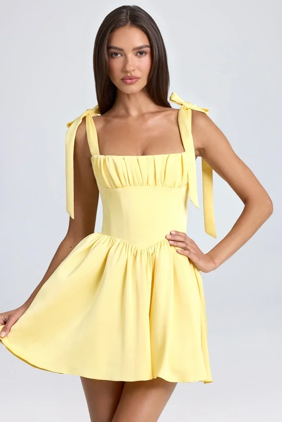 Vestido corto con corsé drapeado Bellamy en color sorbete de limón
