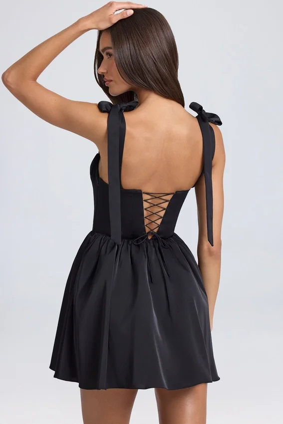 Vestido corto con corsé drapeado Bellamy en negro Vestido corto con corsé drapeado Bellamy en negro