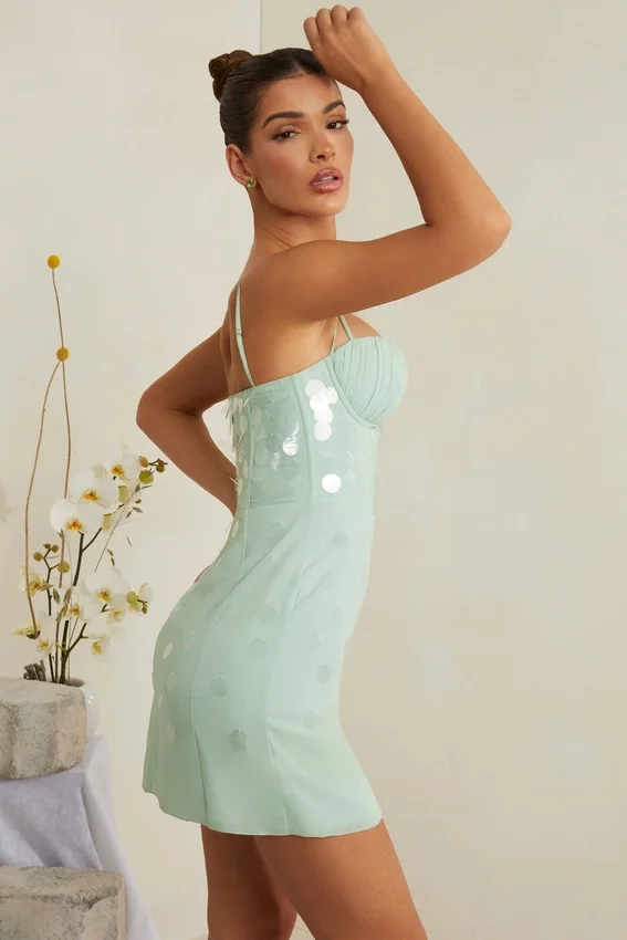 Vestido corto con corsé y adornos Constance en color salvia