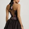 Vestido corto con cuello halter, cordones y bajo abullonado Nanala en estampado floral negro