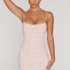 Vestido corto con cuello vuelto y adornos Seychelles en color rosa palo