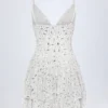 Vestido corto con volantes y adornos Orren en blanco Vestido corto con volantes y adornos Orren en blanco