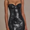 Vestido corto corsé de encaje con lentejuelas Theodora Premium en negro Vestido corto corsé de encaje con lentejuelas Theodora Premium en negro
