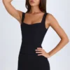 Vestido corto corsé estructurado drapeado Brittany en negro Vestido corto corsé estructurado drapeado Brittany en negro