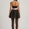 Vestido corto corsé Norina con lazo en negro Vestido corto corsé Norina con lazo en negro