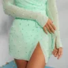 Vestido corto cruzado con adornos Chelsea, corte A, en color menta Vestido corto cruzado con adornos Chelsea, corte A, en color menta