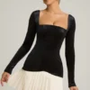 Vestido corto Darline con pliegues en capas y corte corsé en negro Vestido corto Darline con pliegues en capas y corte corsé en negro