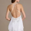 Vestido corto de gasa Mariette con escote pronunciado y espalda abierta en blanco Vestido corto de gasa Mariette con escote pronunciado y espalda abierta en blanco