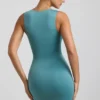 Vestido corto de jersey elástico con aberturas y volantes de Zivanka en verde mar Vestido corto de jersey elástico con aberturas y volantes de Zivanka en verde mar