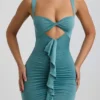 Vestido corto de jersey elástico con aberturas y volantes de Zivanka en verde mar Vestido corto de jersey elástico con aberturas y volantes de Zivanka en verde mar