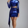 Vestido corto de jersey metalizado con aberturas Nasira en azul eléctrico Vestido corto de jersey metalizado con aberturas Nasira en azul eléctrico