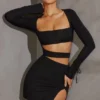 Vestido corto de manga larga con aberturas Enya en negro Vestido corto de manga larga con aberturas Enya en negro