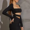 Vestido corto de manga larga con aberturas Enya en negro Vestido corto de manga larga con aberturas Enya en negro