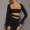 Vestido corto de manga larga con aberturas Enya en negro Vestido corto de manga larga con aberturas Enya en negro