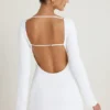 Vestido corto de manga larga con aberturas Mavisa en blanco
