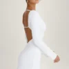 Vestido corto de manga larga con aberturas Mavisa en blanco
