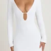 Vestido corto de manga larga con aberturas Mavisa en blanco