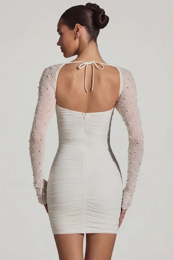Vestido corto de manga larga con adornos St Germain en blanco Vestido corto de manga larga con adornos St Germain en blanco
