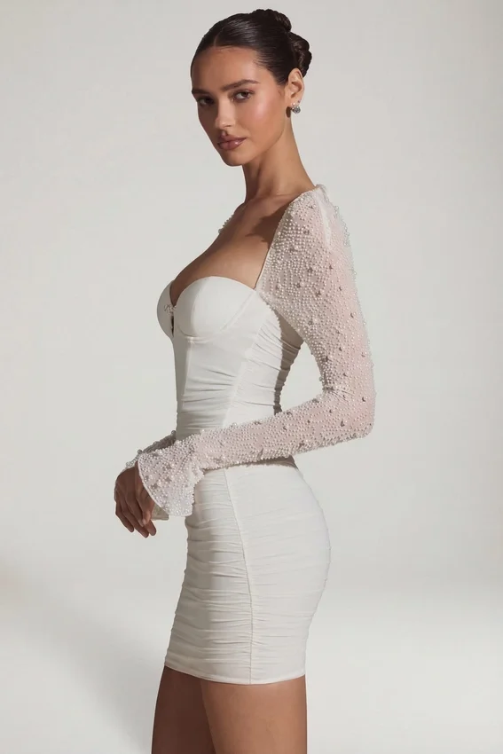 Vestido corto de manga larga con adornos St Germain en blanco Vestido corto de manga larga con adornos St Germain en blanco