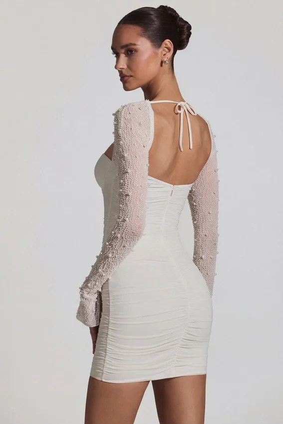 Vestido corto de manga larga con adornos St Germain en blanco Vestido corto de manga larga con adornos St Germain en blanco